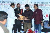 Megastar Distributes Health Cards Photos